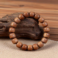 Mysore Sandalwood Barrel Bead Bracelet-Still · Deep Reserve
