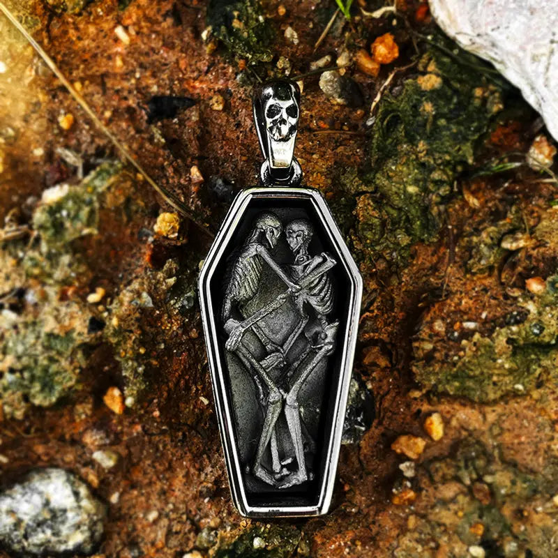 Skeletons Cuddling in a Coffin