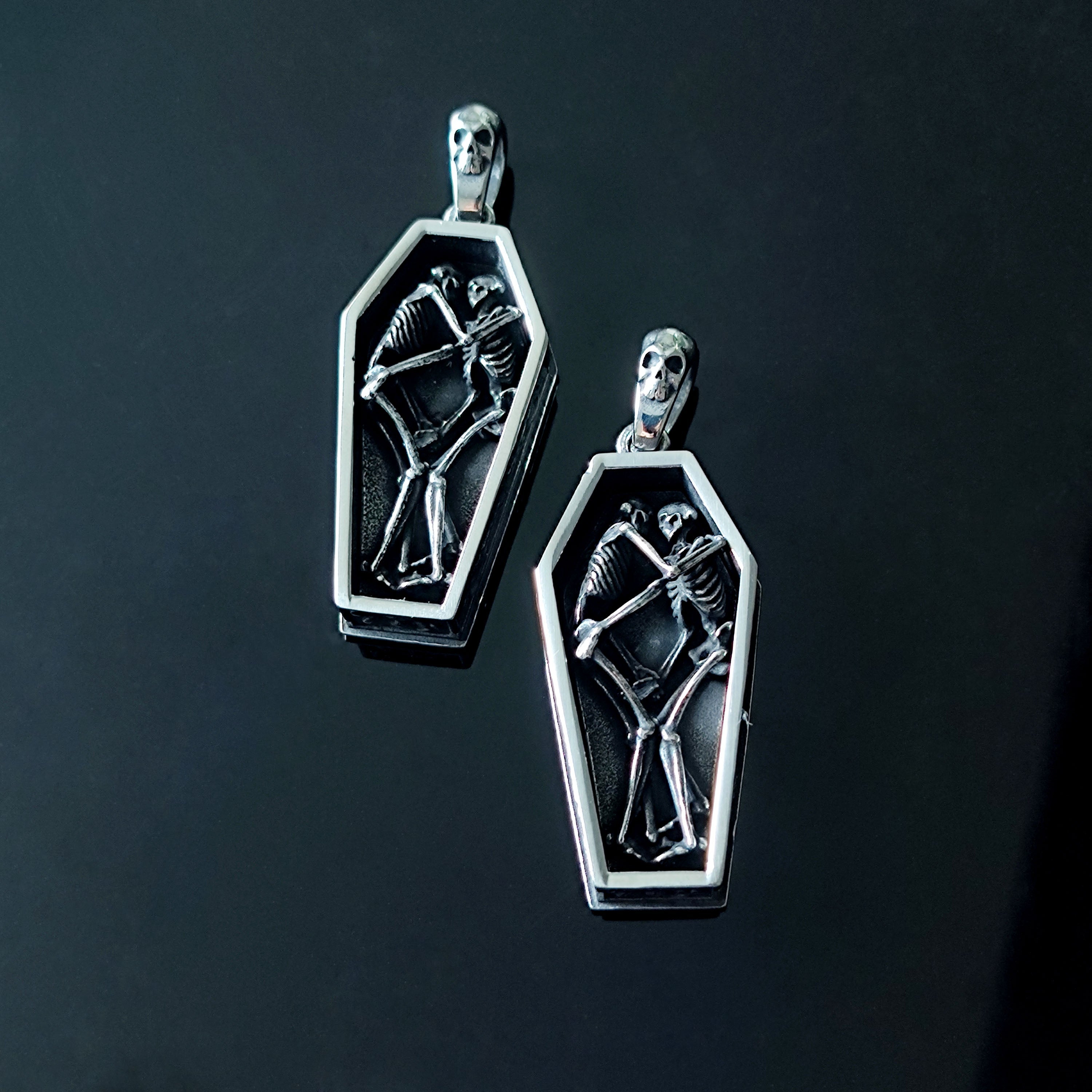 Skeletons Cuddling in a Coffin