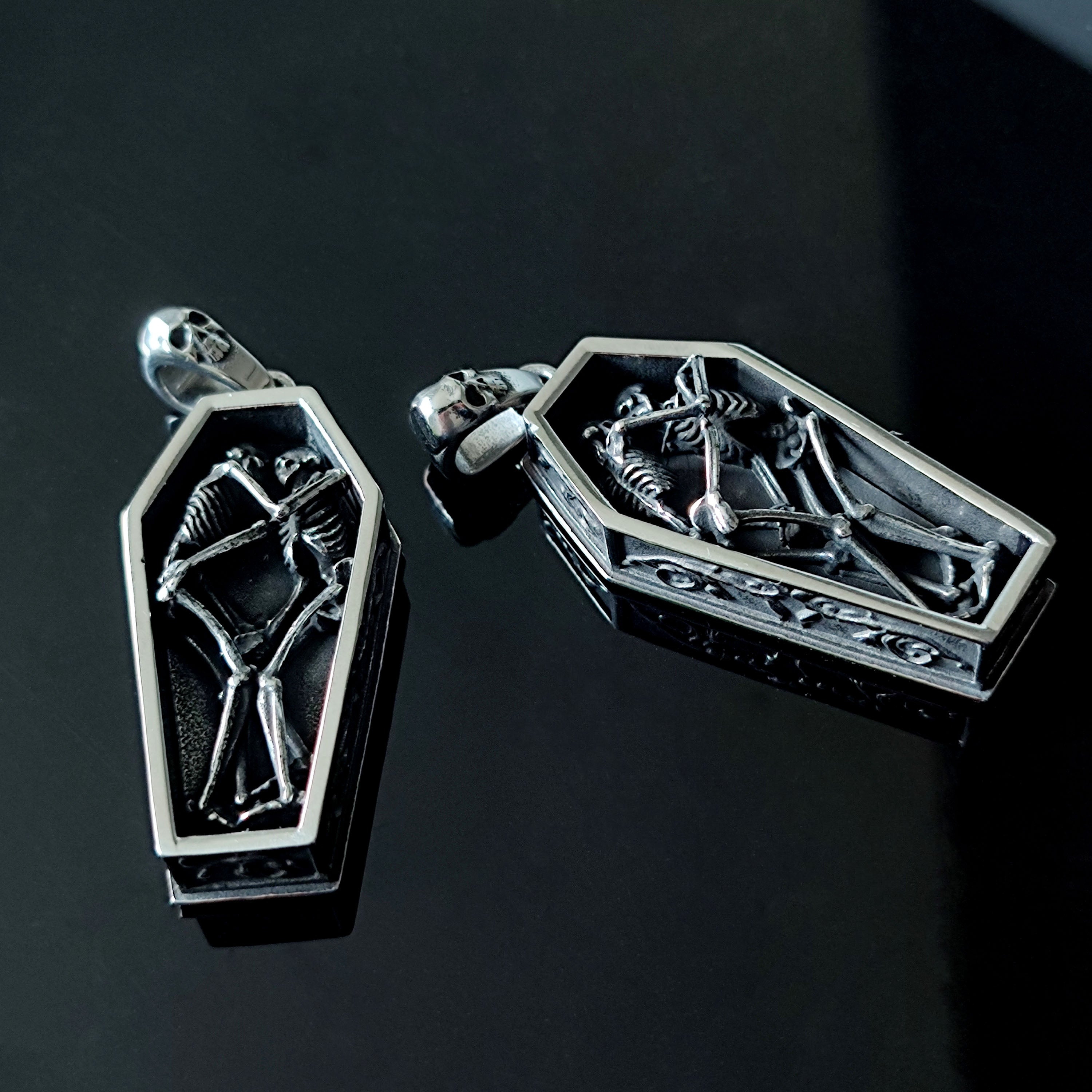 Skeletons Cuddling in a Coffin